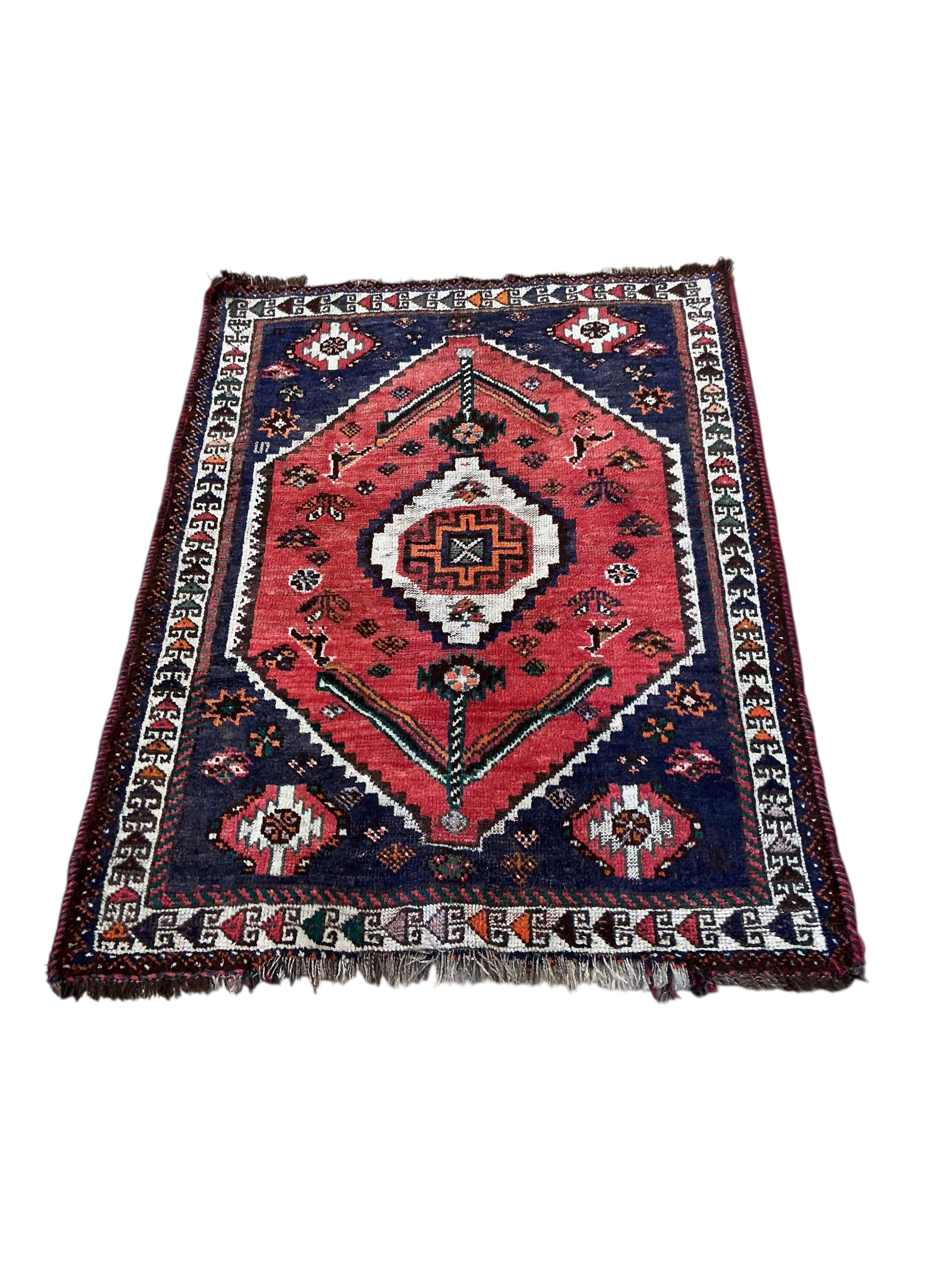 A Belouch rug, a Bokhara mat and a Caucasian style rug, largest 230 x 147cm